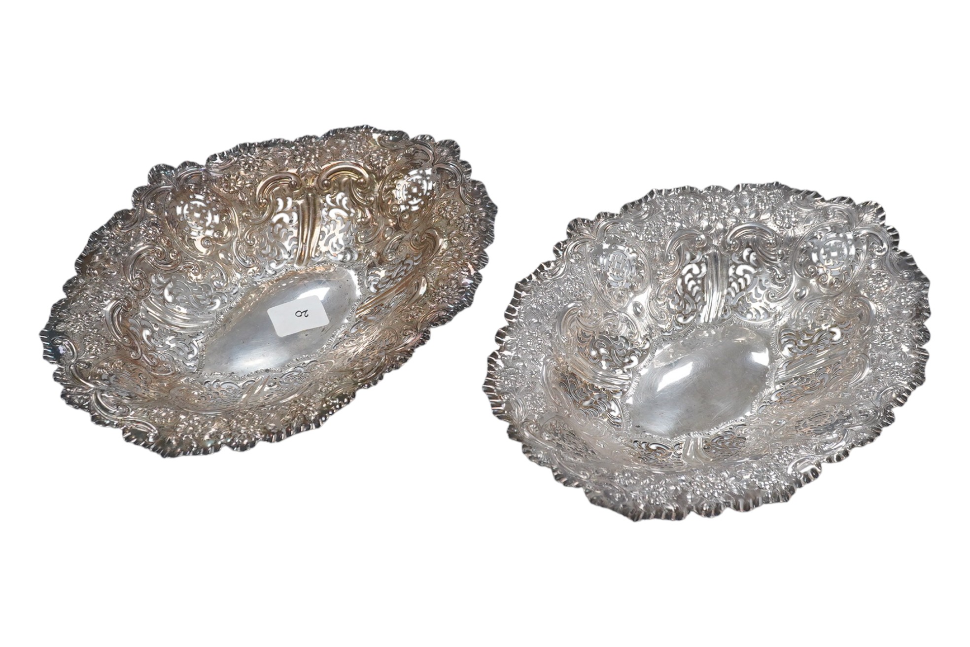 A pair of late Victorian pierced silver oval dishes, by Atkin Brothers, Sheffield, 1896, 27.9cm, 19.7oz. Condition - fair to good